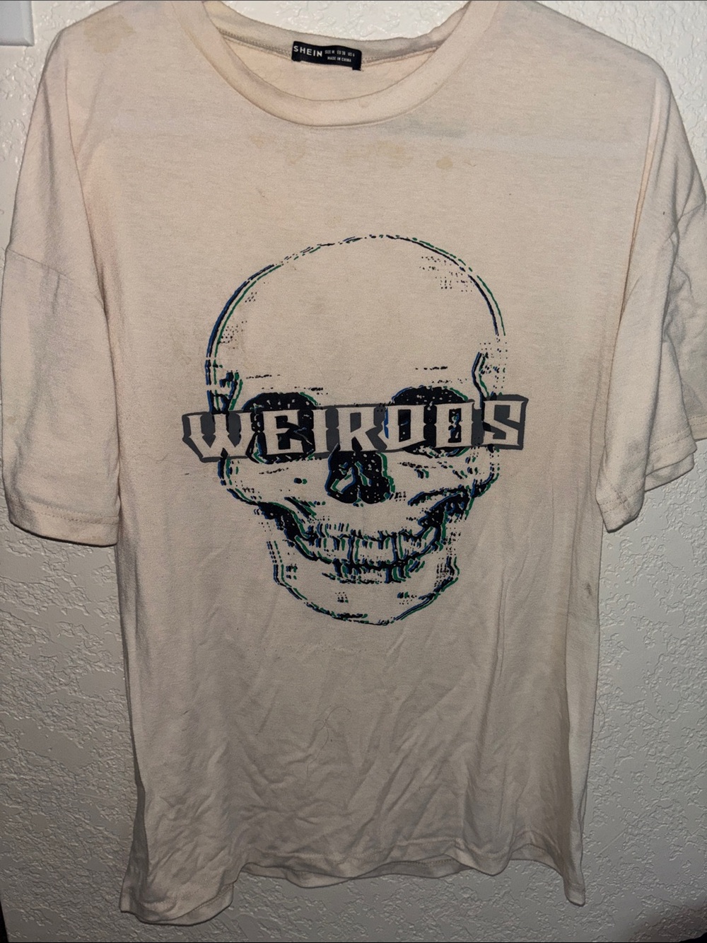 SHEIN Cream Short Sleeve Skull Graphic Tee with WEIRDOS Print